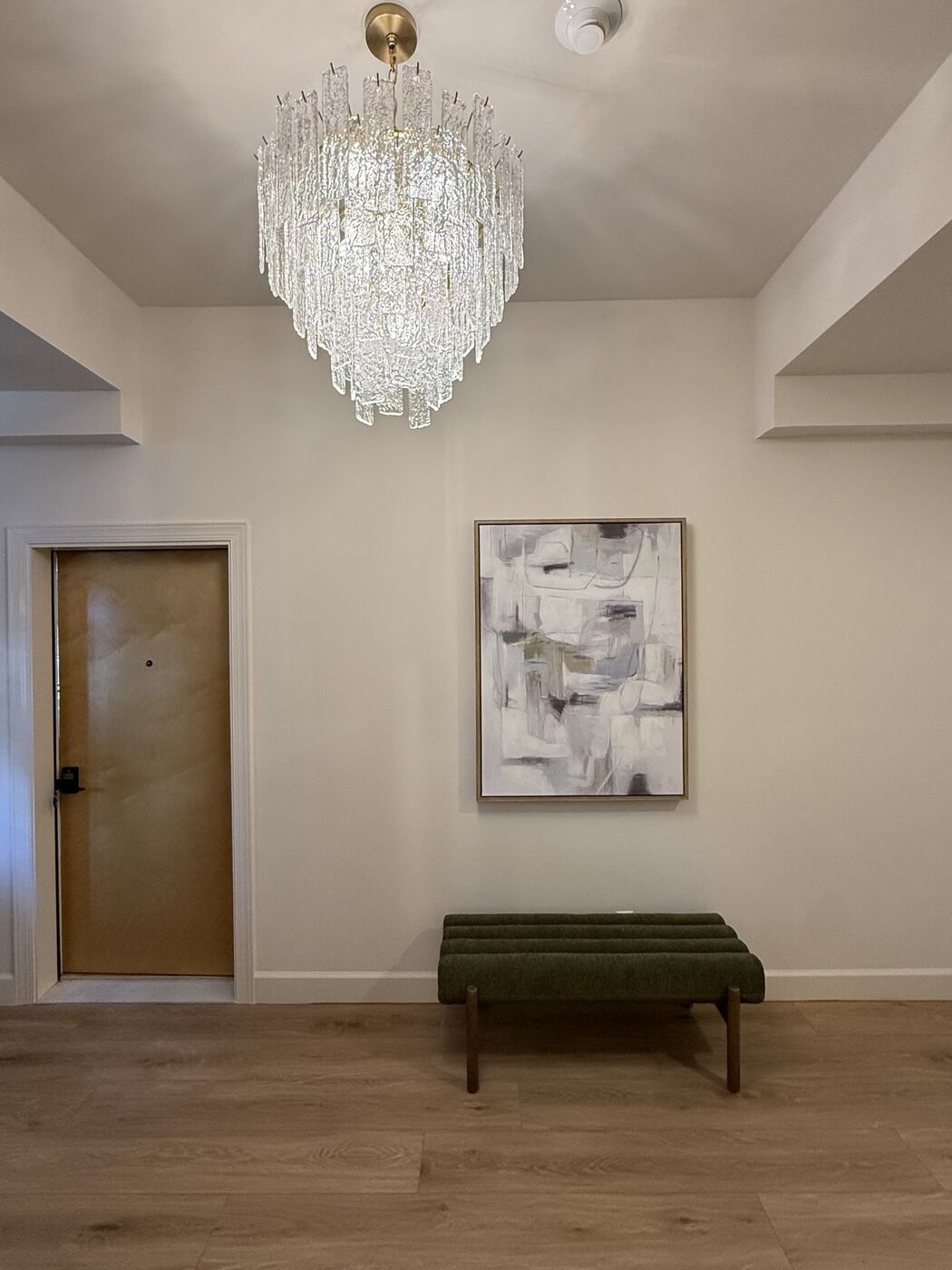 Hallway with green bench